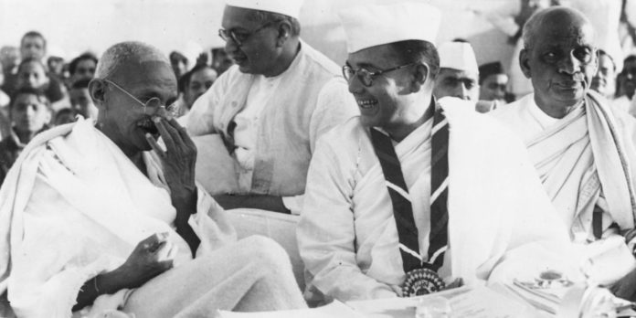 Members of the Indian National Congress (foreground left to right) Mahatma Gandhi (Mohandas Karamchand Gandhi, 1869 - 1948), Subhas Chandra Bose (1897 - 1945) and Vallabhai Patel (1875-1950) during the 51st Indian National Congress.