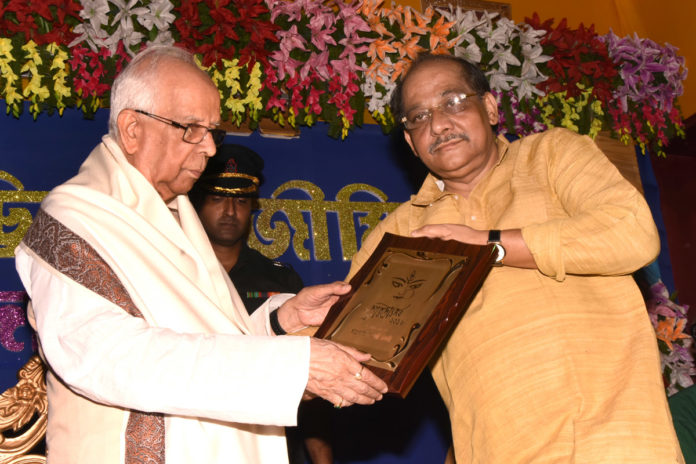 l-r: Honble-Governor-Sri-Kesharinath-Tripathi-with Sushant-Chandra, President-santragachi-miloni-puja