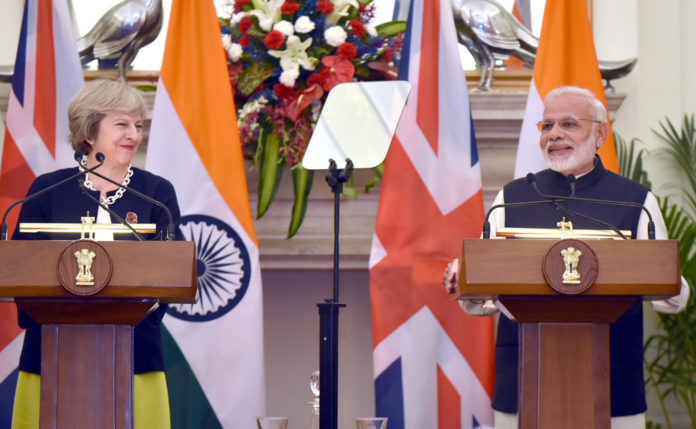 The Prime Minister, Shri Narendra Modi with the Prime Minister of United Kingdom, Ms. Theresa May