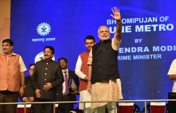 The Prime Minister, Shri Narendra Modi at the foundation stone laying ceremony of the Pune Metro Project (Phase 1), in Pune on December 24, 2016. The Governor of Maharashtra, Shri C. Vidyasagar Rao, the Union Minister for Road Transport & Highways and Shipping, Shri Nitin Gadkari and the Chief Minister of Maharashtra, Shri Devendra Fadnavis are also seen.