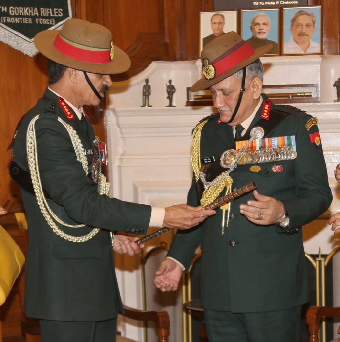General Dalbir Singh handing over the baton to General Bipin Rawat in the office of Chief of Army Staff, in New Delhi on December 31, 2016.