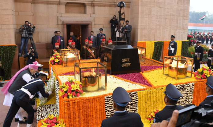 The Prime Minister, Shri Narendra Modi paying homage at the Amar Jawan Jyoti, India Gate, on the occasion of the 68th Republic Day Parade 2017, in New Delhi on January 26, 2017.