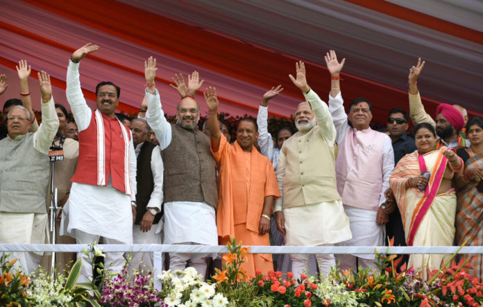 The Prime Minister, Shri Narendra Modi at the swearing-in ceremony of the new government of Uttar Pradesh, at Lucknow on March 19, 2017. The Union Minister for Micro, Small and Medium Enterprises, Shri Kalraj Mishra, the Chief Minister of Uttar Pradesh, Yogi Adityanath and other dignitaries are also seen.