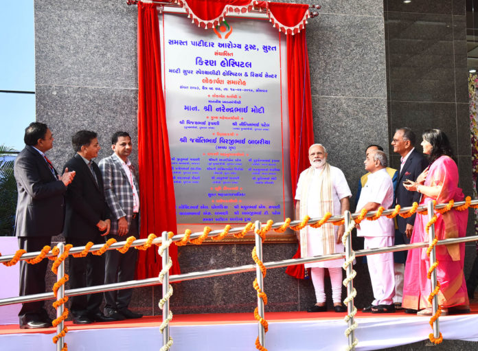 The Prime Minister, Shri Narendra Modi inaugurated the Kiran Multispeciality Hospital, in Surat, Gujarat on April 17, 2017. The Deputy Chief Minister of Gujarat, Shri Nitinbhai Patel and other dignitaries are also seen.