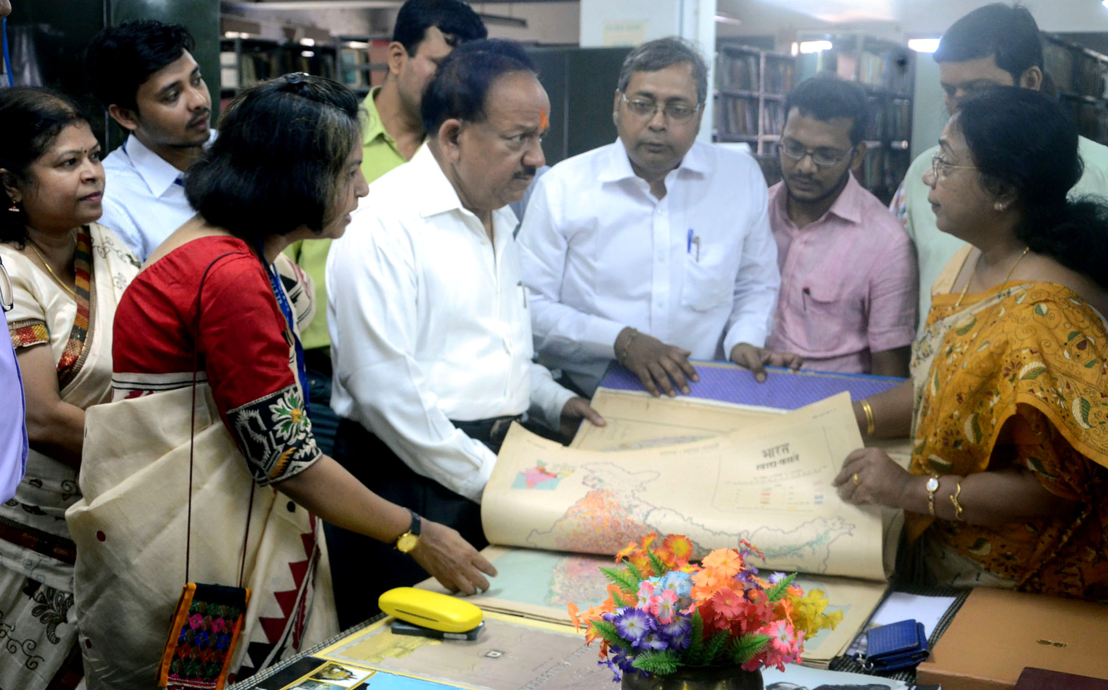 The Union Minister for Science & Technology and Earth Sciences, Dr. Harsh Vardhan looking at the maps, published by the National Atlas and Thematic Mapping Organisation (NATMO), Department of Science & Technology, in Kolkata on May 04, 2017.