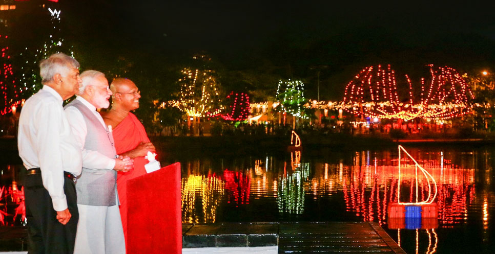 The Prime Minister, Shri Narendra Modi and the Prime Minister of the Democratic Socialist Republic of Sri Lanka, Mr. Ranil Wickremesinghe watching the multi coloured lights and fireworks display after switching on the lights at Seema Malaka Temple, in Colombo, Sri Lanka on May 11, 2017.