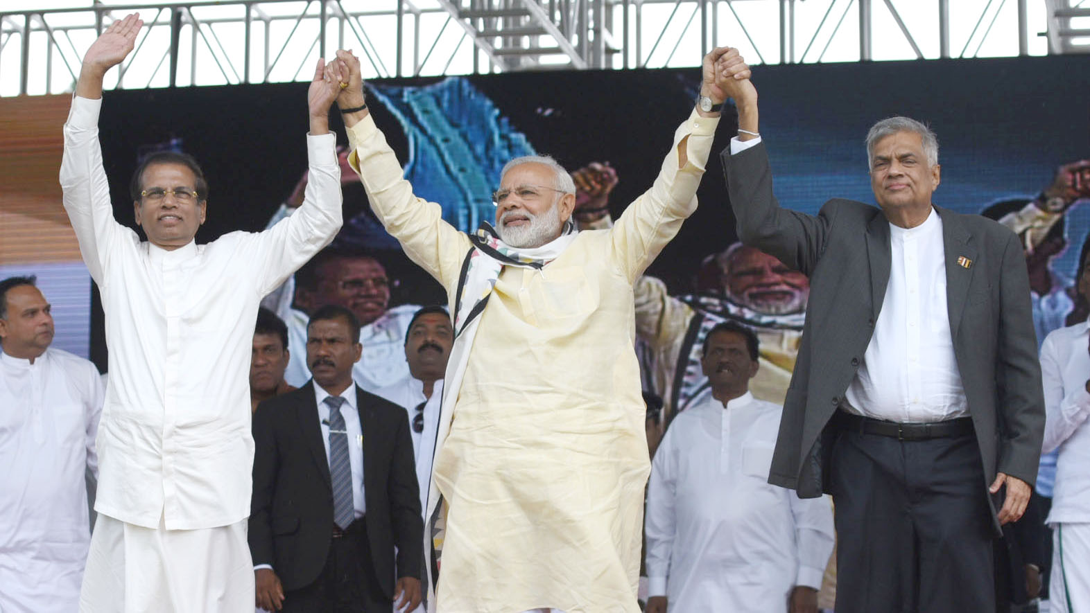 The Prime Minister, Shri Narendra Modi at the Indian Origin Tamil Community function, at Norwood Grounds, Dickoya, in Sri Lanka on May 12, 2017. The President of the Democratic Socialist Republic of Sri Lanka, Mr. Maithripala Sirisena and the Prime Minister of the Democratic Socialist Republic of Sri Lanka, Mr. Ranil Wickremesinghe are also seen.