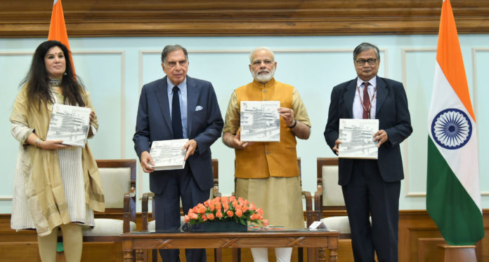 The Prime Minister, Shri Narendra Modi releasing the Platinum Jubilee Milestone book on Tata Memorial Centre, in New Delhi on May 25, 2017. Shri Ratan Tata and other dignitaries are also seen.