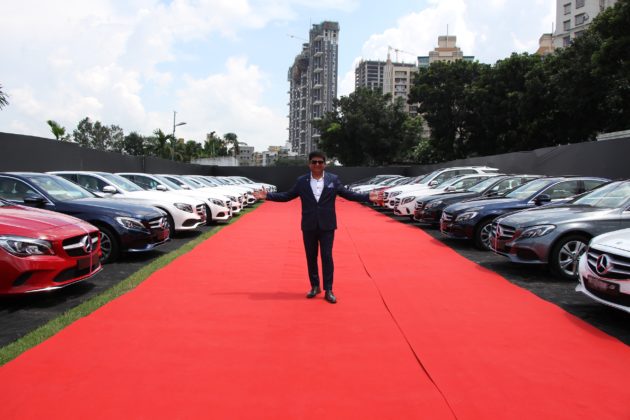 Mr. Paras Somani - Executive Director, Landmark Group with the fleet of 51 Mercedes-Benz cars delivered today