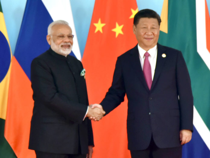 The Prime Minister, Shri Narendra Modi being welcomed by the President of the Peoples Republic of China, Mr. Xi Jinping, at the 9th BRICS summit, in Xiamen, China on September 04, 2017.