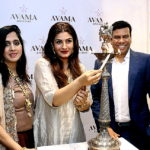 L-R – Mrs. Suman Kajaria, Actress Raveena Tandon & Mr. Abhishek kajaria were lightening the lamp