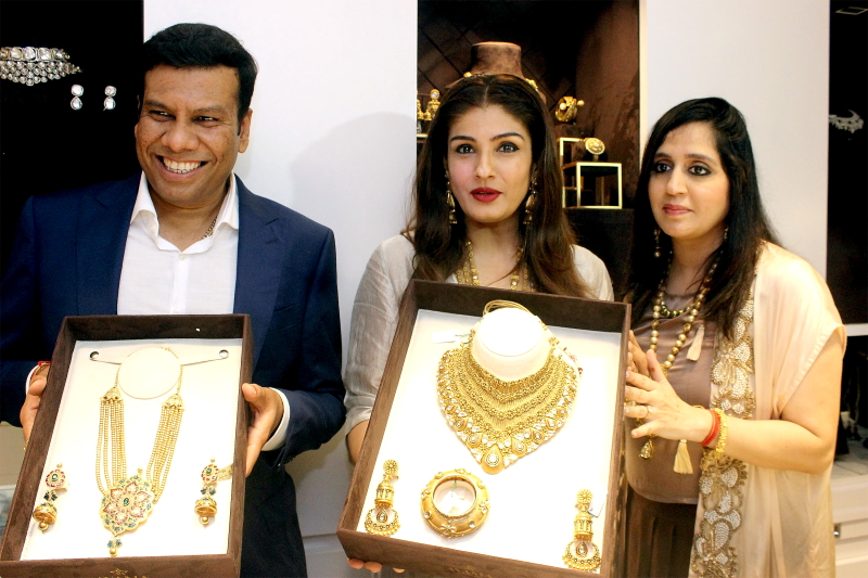 Mr. Abhishek Kajaria, Actress Raveena Tandon & Mrs. Suman Kajaria were showcasing the collection of Avama Jewellers
