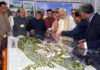 The Prime Minister, Shri Narendra Modi being briefed on structure of AIIMS, in Bilaspur, Himachal Pradesh on October 03, 2017. The Union Minister for Health & Family Welfare, Shri J.P. Nadda, the Chief Minister of Himachal Pradesh, Shri Virbhadra Singh and other dignitaries are also seen.