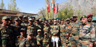 The Prime Minister, Shri Narendra Modi celebrating the Diwali with the jawans of the Indian Army and BSF, in the Gurez Valley, near the Line of Control, in Jammu and Kashmir, on October 19, 2017. The Chief of Army Staff, General Bipin Rawat is also seen.