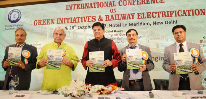 The Union Minister for Railways and Coal, Shri Piyush Goyal releasing the souvenir, at the inauguration of the International Conference on Green Initiatives & Railway Electrification, organised by the Ministry of Railways through Institution of Railways Electrical Engineer (IREE), in New Delhi on October 27, 2017. The Minister of State for Communications (I/C) and Railways, Shri Manoj Sinha, the Member Traction Railway Board & Patron, IREE, Shri Ghanshyam Singh and other dignitaries are also seen.