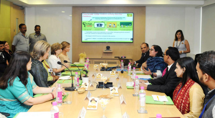 The Her Majesty Queen Mathilde of Belgium along with the Union Minister for Women and Child Development, Smt. Maneka Sanjay Gandhi looking at the presentation and the film on Childline, at the Childline (1098) Contact Centre of Ministry of Women and Child Development, in Gurugram, Haryana on November 07, 2017.