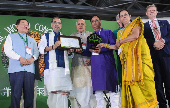 The Union Minister for Agriculture and Farmers Welfare, Shri Radha Mohan Singh giving away the Dharti Mitr Award to the winners, at the inauguration of the 19th Organic World Congress 2017, at Greater Noida, Uttar Pradesh on November 09, 2017. The Chief Minister of Sikkim, Shri Pawan Kumar Chamling and the Agriculture Minister of Uttar Pradesh, Shri Surya Pratap Shahi are also seen.