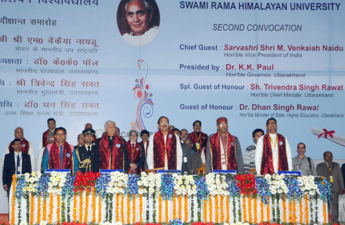 The Vice President, Shri M. Venkaiah Naidu at the 2nd Convocation of Swami Rama Himalayan University, in Dehradun, Uttarakhand on December 05, 2017. The Governor of Uttarakhand, Shri Krishan Kant Paul, the Chief Minister of Uttarakhand, Shri Trivender Singh Rawat, the Minister of State for Higher Education, Uttarakhand, Dr. Dhan Singh Rawat and other dignitaries are also seen.