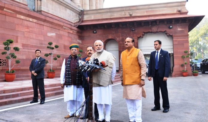 The Prime Minister, Shri Narendra Modi delivering his statement to media outside the Parliament House at the start of the Winter Session of Parliament, in New Delhi on December 15, 2017. The Union Minister for Chemicals & Fertilizers and Parliamentary Affairs, Shri Ananth Kumar, the Minister of State for Development of North Eastern Region (I/C), Prime Ministers Office, Personnel, Public Grievances & Pensions, Atomic Energy and Space, Dr. Jitendra Singh and the Minister of State for Parliamentary Affairs, Water Resources, River Development and Ganga Rejuvenation, Shri Arjun Ram Meghwal are also seen.