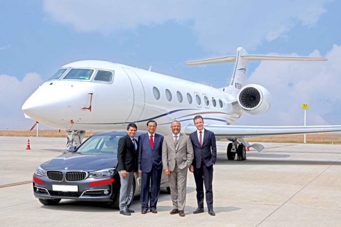 (L-R) Mr. Ashish Kachalia, Director, Navnit Motors; Mr. Navnit Kachalia, Dealer Principal, Navnit Motors; Mr. Javed Malik, Chief Operating Officer, Bengaluru International Airport Limited and Mr. René Gerhard, Director, Sales, BMW Group India at a special handover ceremony at the Bengaluru International Airport (PRNewsfoto/BMW India Private Limited)