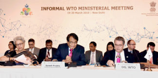 The Union Minister for Commerce & Industry and Civil Aviation, Shri Suresh Prabhakar Prabhu addressing the Informal WTO Ministerial Meeting, in New Delhi on March 20, 2018. The DG, WTO, Mr. Roberto Azevedo and the Commerce Secretary, Ms. Rita A. Teaotia are also seen.