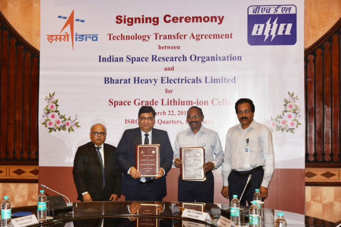 The Chairman, ISRO, Dr. K. Sivan, the CMD, BHEL, Shri Atul Sobti, the Director, BHEL (E,R&D), Shri Subrata Biswas and the Director, Vikram Sarabhai Space Centre, Shri S. Somanath, during the Technology Transfer Agreement (TTA) signing ceremony, at Bengaluru on March 22, 2018.