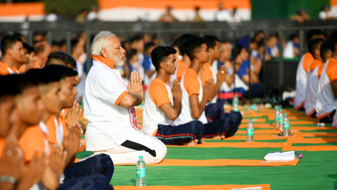 The Prime Minister, Shri Narendra Modi participates in the mass yoga demonstration, on the occasion of the 4th International Day of Yoga 2018, at the Forest Research Institute, in Dehradun, Uttarakhand on June 21, 2018.