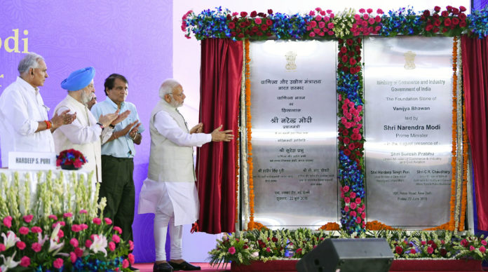 The Prime Minister, Shri Narendra Modi unveiling a plaque to mark the laying of foundation stone of Vanijya Bhawan, at Akbar Road, in New Delhi on June 22, 2018. The Union Minister for Commerce & Industry and Civil Aviation, Shri Suresh Prabhakar Prabhu, the Minister of State for Housing and Urban Affairs (I/C), Shri Hardeep Singh Puri and the Minister of State for Consumer Affairs, Food & Public Distribution and Commerce & Industry, Shri C.R. Chaudhary are also seen.