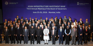Prime Minister Modi addressed the guests at the opening ceremony of the Third Annual Meeting of AIIB The Prime Minister, Shri Narendra Modi in a group photograph at the Third Annual Meeting of the Asian Infrastructure Investment Bank (AIIB), in Mumbai on June 26, 2018. The Governor of Maharashtra, Shri C. Vidyasagar Rao, the Union Minister for Railways, Coal, Finance and Corporate Affairs, Shri Piyush Goyal, the Chief Minister of Maharashtra, Shri Devendra Fadnavis and other dignitaries are also seen.