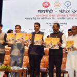 The Union Minister for Railways, Coal, Finance and Corporate Affairs, Shri Piyush Goyal along with the Union Minister for Road Transport & Highways, Shipping and Water Resources, River Development & Ganga Rejuvenation, Shri Nitin Gadkari and the Chief Minister of Maharashtra, Shri Devendra Fadnavis releasing the publication at the signing ceremony of an MoU between Indian Railways and MahaMetro (Metro Railway Project Company of Maharashtra) for creating a Mass Rapid Transit System (MRTS), in Nagpur city, Maharashtra on July 16, 2018. The Secretary, Ministry of Housing and Urban Affairs, Shri Durga Shanker Mishra and other dignitaries are also seen.