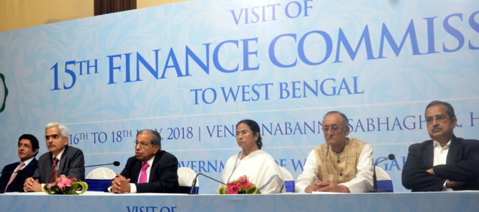 The Chairman of the 15th Finance Commission, Shri N.K. Singh along with the Chief Minister of West Bengal, Ms. Mamata Banerjee and other dignitaries addressing press conference, at Nabanna, in Kolkata on July 17, 2018.
