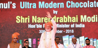 The Prime Minister, Shri Narendra Modi at the inauguration of the Amul’s ultra-modern Chocolate Plant, at Anand, Gujarat on September 30, 2018. The Chief Minister of Gujarat, Shri Vijay Rupani, the Minister of State for Tribal Affairs, Shri Jaswantsinh Sumanbhai Bhabhor and other dignitaries are also seen.