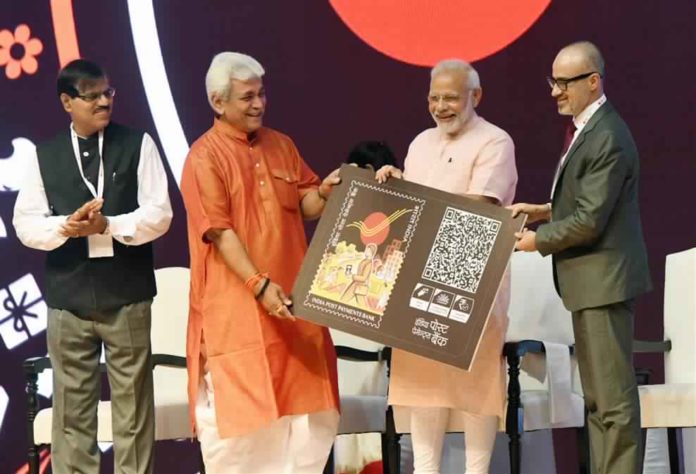 The Prime Minister, Shri Narendra Modi at the launch of the India Post Payments Bank, in New Delhi on September 01, 2018. The Minister of State for Communications (I/C) and Railways, Shri Manoj Sinha and the Secretary (Post), Shri Ananta Narayan Nanda are also seen.