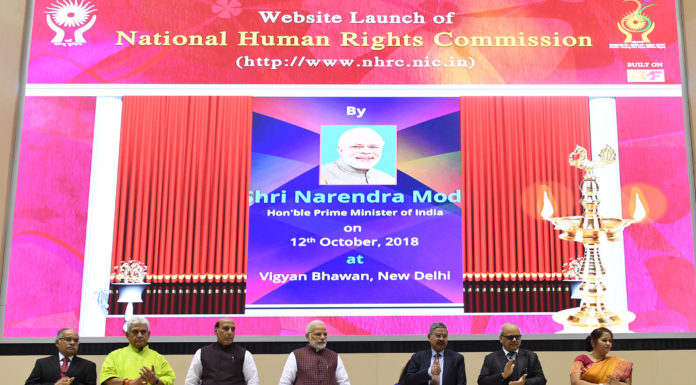 The Prime Minister, Shri Narendra Modi at the Silver Jubilee Foundation Day function of the National Human Rights Commission, in New Delhi on October 12, 2018. The Union Home Minister, Shri Rajnath Singh, the Minister of State for Communications (I/C) and Railways, Shri Manoj Sinha and other dignitaries are also seen.