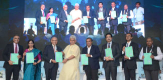 The Minister of State for Communications (I/C) and Railways, Shri Manoj Sinha releasing the publication, at the inauguration of the India Mobile Congress - 2018, in New Delhi on October 25, 2018. The Secretary, (Telecom), Ms. Aruna Sundararajan and other dignitaries are also seen.