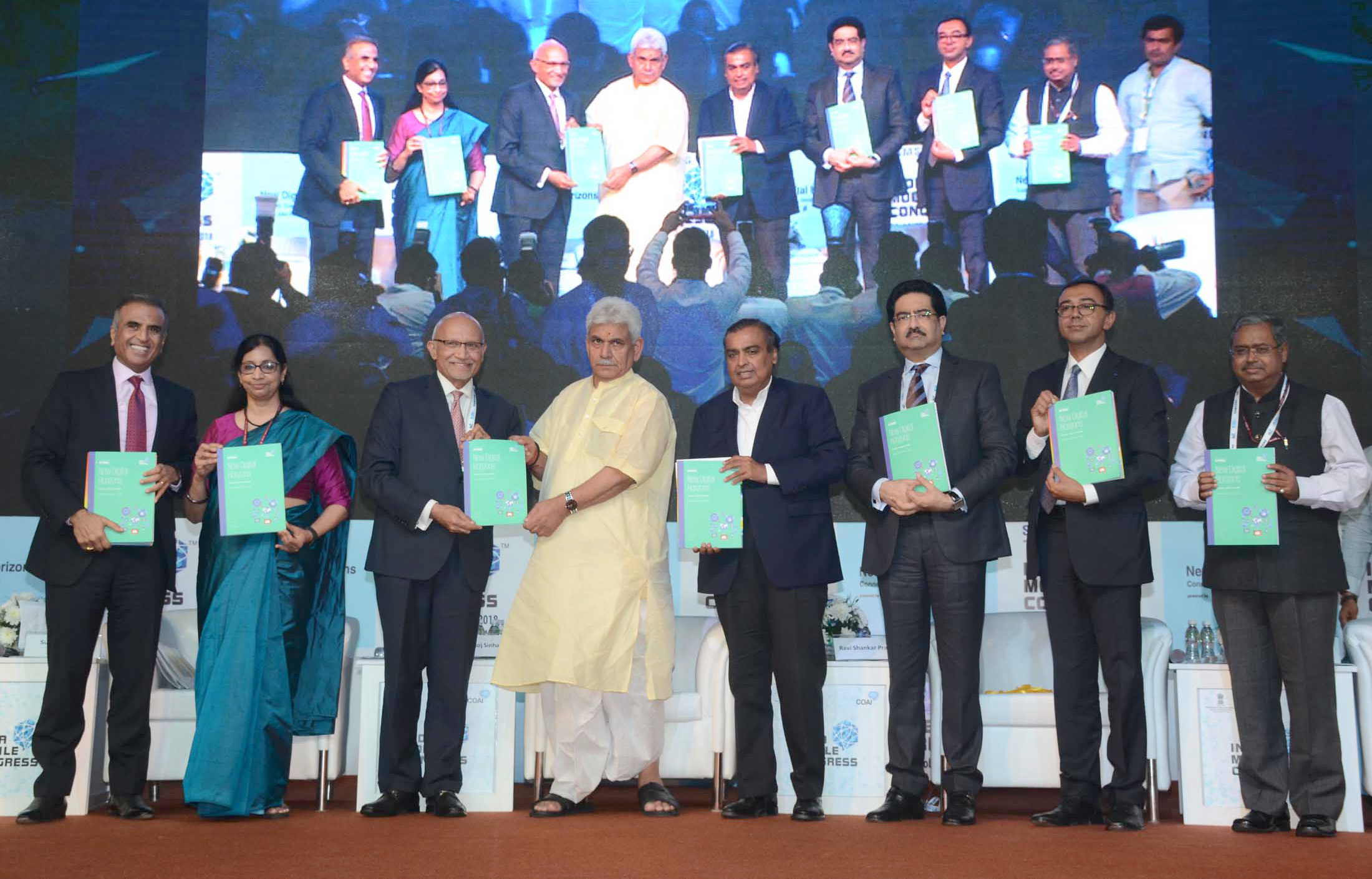 The Minister of State for Communications (I/C) and Railways, Shri Manoj Sinha releasing the publication, at the inauguration of the India Mobile Congress - 2018, in New Delhi on October 25, 2018. The Secretary, (Telecom), Ms. Aruna Sundararajan and other dignitaries are also seen.