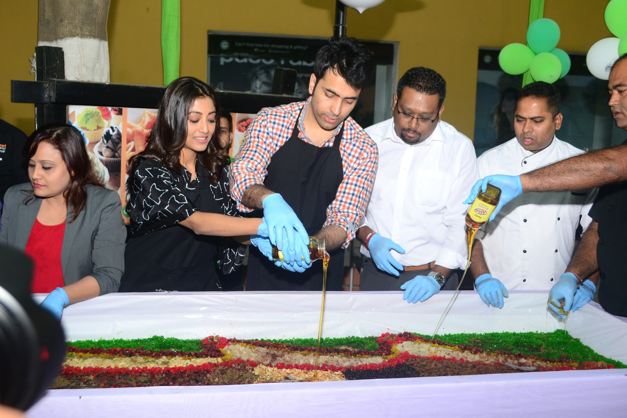 Abir Chatterjee and Paoli Dam and Mayukh Ray ,President Sales and Marketing at Cake Mixing Ceremony at Afraa Deli, City Centre 1