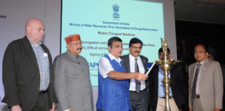 The Union Minister for Road Transport & Highways, Shipping and Water Resources, River Development & Ganga Rejuvenation, Shri Nitin Gadkari lighting the lamp at the signing ceremony of an MoU between WAPCOs and M/s Doppelmayr, Austria for Modern Transport Solutions for Decongestion and Last Mile Connectivity in Urban Areas and Hilly, Difficult & Inaccessible Terrains, in New Delhi on November 05, 2018.