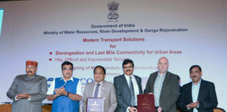 The Union Minister for Road Transport & Highways, Shipping and Water Resources, River Development & Ganga Rejuvenation, Shri Nitin Gadkari witnessing the signing ceremony of an MoU between WAPCOs and M/s Doppelmayr, Austria for Modern Transport Solutions for Decongestion and Last Mile Connectivity in Urban Areas and Hilly, Difficult & Inaccessible Terrains, in New Delhi on November 05, 2018. The Secretary, Water Resources, River Development and Ganga Rejuvenation, Shri U.P. Singh and other dignitaries are also seen.