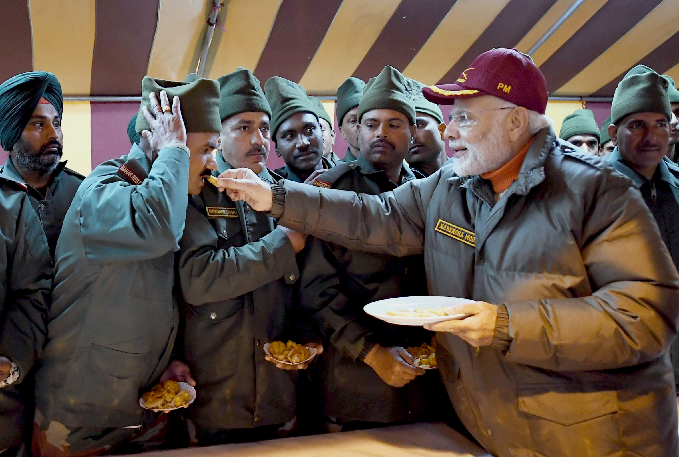 The Prime Minister, Shri Narendra Modi celebrating Diwali with the jawans of the Indian Army and ITBP, at Harsil, in Uttarakhand on November 07, 2018.