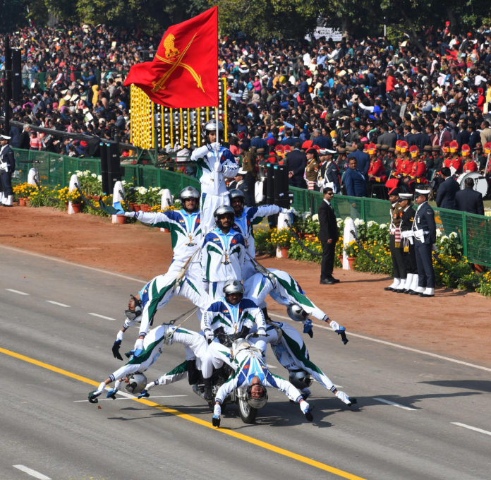 Rajpath comes alive with the dare devil stunts of motorbike riders of Corps of Military Police, at the 70th Republic Day Celebrations, in New Delhi on January 26, 2019.