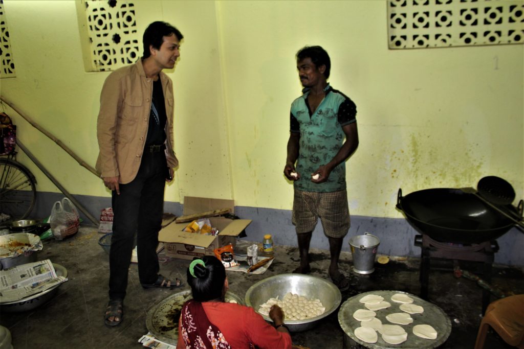 Sambaran with the cook at Saraswati Puja at Bipin Bihari Apartment