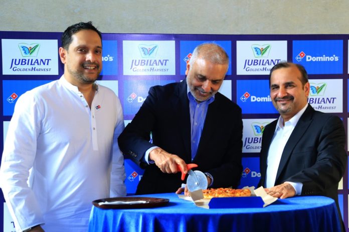 . Hari S. Bhartia, Co-Chairman, Jubilant FoodWorks Limited, Mr. Pratik Pota, CEO & Whole-time Director, Jubilant FoodWorks Limited and Mr. Rajeeb Samdani, Managing Director, Golden Harvest Group launch first Domino's Pizza restaurant in Dhaka, Bangladesh