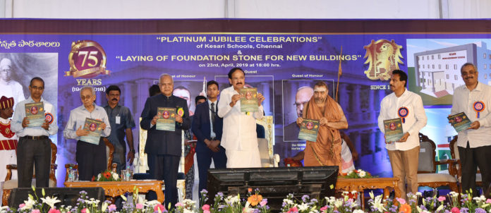 The Vice President, Shri M. Venkaiah Naidu releasing the souvenir at the Platinum Jubilee Celebrations of Kesari Schools, in Chennai on April 23, 2019. The Governor of Tamil Nadu, Shri Banwarilal Purohit and other dignitaries are also seen.