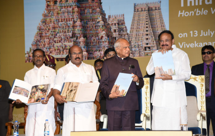 The Vice President, Shri M. Venkaiah Naidu releasing the coffee table book Sri Ranganathaswamy temple, Srirangam, Preserving Antiquity for Posterity, in Chennai on July 13, 2019. The Governor of Tamil Nadu, Shri Banwarilal Purohit and other dignitaries are also seen.