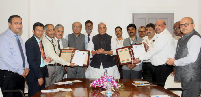 The Union Minister for Defence, Shri Rajnath Singh witnessing the exchange of an MoU for setting up of Kalam Centre for Science & Technology at the University between DRDO and Central University of Jammu (CUJ), in New Delhi on September 26, 2019. The Secretary, Department of Defence R&D and Chairman, DRDO, Dr. G. Satheesh Reddy, the Chancellor of CUJ, Ambassador G. Parthasarthi and the Vice Chancellor of CUJ, Prof. Ashok Aima are also seen.