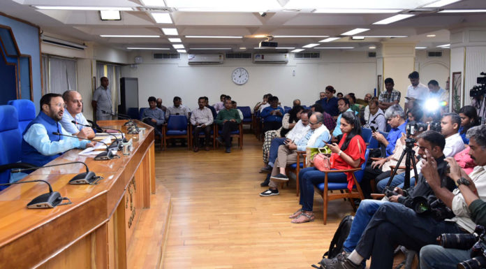 The Union Minister for Environment, Forest & Climate Change and Information & Broadcasting, Shri Prakash Javadekar briefing the media on Cabinet Decisions, in New Delhi on October 09, 2019. The Principal Director General (M&C), Press Information Bureau, Shri K.S. Dhatwalia is also seen.