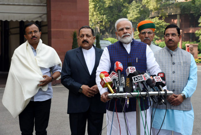 The Prime Minister, Shri Narendra Modi addressing the media ahead of the winter session of Parliament, in New Delhi on November 19, 2019. The Union Minister for Parliamentary Affairs, Coal and Mines, Shri Pralhad Joshi, the Minister of State for Development of North Eastern Region (I/C), Prime Ministers Office, Personnel, Public Grievances & Pensions, Atomic Energy and Space, Dr. Jitendra Singh, the Minister of State for Parliamentary Affairs and Heavy Industries & Public Enterprises, Shri Arjun Ram Meghwal and the Minister of State for External Affairs and Parliamentary Affairs, Shri V. Muraleedharan are also seen.