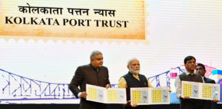 The Prime Minister, Shri Narendra Modi releasing the commemorative stamp marking celebrations of 150 years of Kolkata Port Trust, in Kolkata, West Bengal on January 12, 2020. The Governor of West Bengal, Shri Jagdeep Dhankhar and the Minister of State for Shipping (Independent Charge) and Chemicals & Fertilizers, Shri Mansukh L. Mandaviya are also seen.