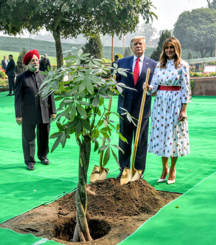 The President of United States of America (USA), Mr. Donald Trump and First Lady Mrs. Melania Trump plant a tree sapling at the Samadhi of Mahatma Gandhi, at Rajghat, in Delhi on February 25, 2020. 	The Minister of State for Housing & Urban Affairs, Civil Aviation (Independent Charge) and Commerce & Industry, Shri Hardeep Singh Puri is also seen.
